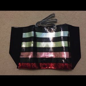 Victoria’s Secrets sequin tote and clutch